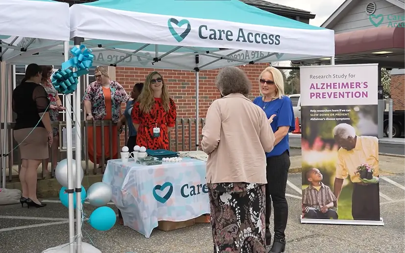 Trial Access Partner providing educational materials to patients